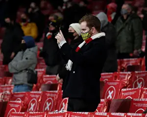 Arsenal Fans Cheering Loudly at Emirates Stadium during Europa League Match against Rapid Wien (2020-21)
