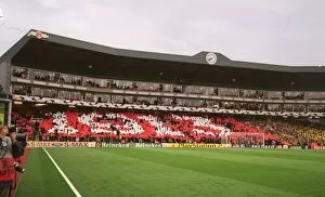 Arsenal v Villarreal 2005-6 Gallery: Arsenal fans in the Clock End hold up cards that read 1913