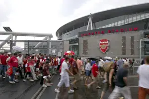 Arsenal fans cross the North Bridge to get to Emirates Stadium