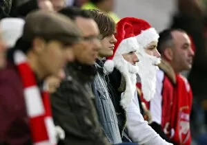 Middlesbrough v Arsenal 2008-09 Collection: Arsenal fans dressed as Father Christmas