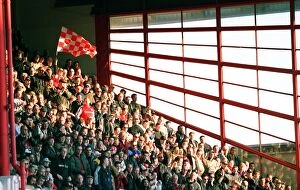 Fans Collection: Arsenal fans in the East Stand Upper tier. Arsenal 5: 2 Gillingham, The AXA F