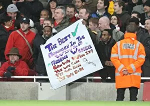 Images Dated 11th November 2008: Arsenal fans show a flag in support of Arsene Wenger