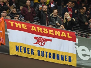 Images Dated 23rd November 2017: Arsenal fans flags in the stadium before the match. FC Koln 1: 0 Arsenal. UEFA Europa Cup