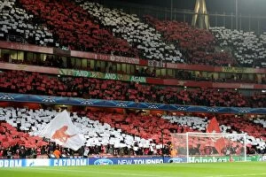 Images Dated 19th February 2014: Arsenal fans hold up cards before the match. Arsenal 0: 2 Bayern Munich. UEFA Champions League