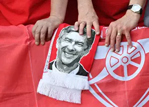 Arsenal Fans Honor Arsene Wenger with Banners at Huddersfield Match
