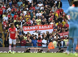 Manchester City v Arsenal 2021-22 Collection: Arsenal Fans Honor Late Supporter Danny Bailey Before Manchester City Clash