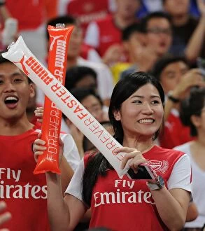 Images Dated 18th July 2015: Arsenal Fan's Passion: A Sea of Red at the Arsenal vs. Everton Asia Trophy, Singapore, 2015