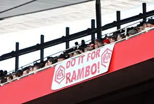 Arsenal V Burnley 2009-10 Prints: Arsenal Fans Rally: Unwavering Support for Injured Aaron Ramsey Amidst 3:1 Victory