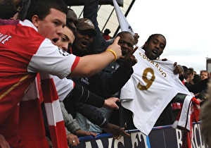 Images Dated 24th February 2008: Arsenal fans show their respect for injured Arsenal striker Eduardo