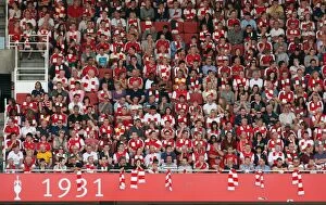 Arsenal v Portsmouth 2009-10 Collection: Arsenal fans with their scarves