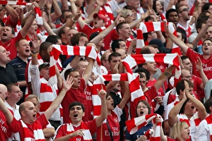 Arsenal v Portsmouth 2009-10 Collection: Arsenal fans with their scarves
