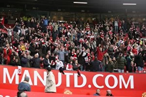 Fans Collection: Arsenal fans stay in the stadium and sing for 25 minutes after the final whistle