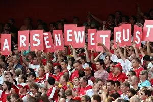 Arsenal fans show their support for the Manager