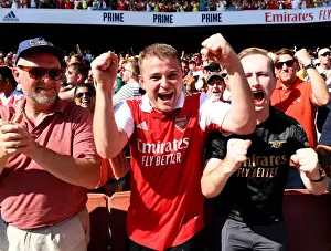 Arsenal Fans in Full Swing: Celebrating a Thrilling Victory over Leicester City, Premier League 2022-23