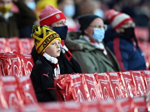 Images Dated 3rd December 2020: Arsenal Fans in Full Swing: Cheering at Emirates Stadium during Europa League Match