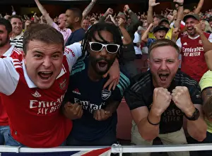 Arsenal Fans Triumphant Roar: Celebrating Victory Over Fulham in the 2022-23 Premier League