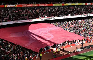 Arsenal Fans Unite: Cannon Banner at Emirates Stadium