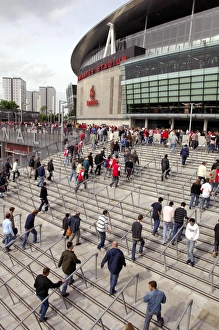 Arsenal fans walk up the the stadium before the match Arsenal fans walk up the the stadium before the match