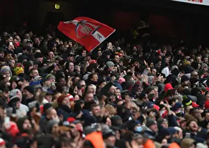 Arsenal V Newcastle United 2021-22 Prints: Arsenal Fans Wave Flag at Emirates Stadium During Arsenal v Newcastle United Premier League Match