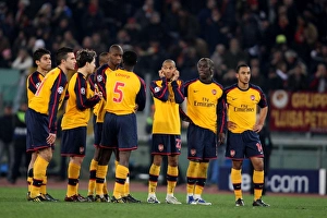 The Arsenal fans wiat for the penaltys to be taken