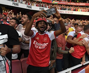 Images Dated 3rd September 2023: Arsenal Fans Go Wild: Celebrating the Second Goal Against Manchester United (2023-24)