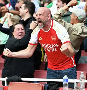Arsenal V Tottenham Hotspur 2023-24 Prints: Arsenal Fans Go Wild: Celebrating the Second Goal Against Tottenham in the 2023-24 Premier League