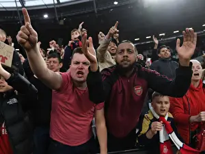 West Ham United V Arsenal 2021-22 Prints: Arsenal Fans Go Wild: Premier League Victory Celebration vs. West Ham United