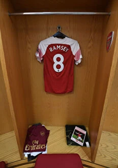 Images Dated 29th September 2018: Arsenal FC: Aaron Ramsey's Empty Jersey in the Changing Room Before Arsenal v Watford (2018-19)