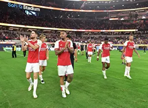 Arsenal and FC Barcelona: Clasico Showdown in Inglewood - Arsenal Players Celebrate with Fans