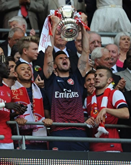 Arsenal FC: Carl Jenkinson Lifts the FA Cup Trophy