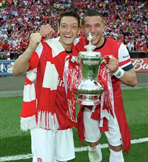 Arsenal FC: Celebrating FA Cup Victory - Ozil and Podolski's Triumph