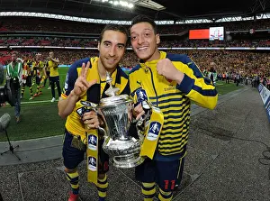 Arsenal V Aston Villa - FA Cup Final 2015 Prints: Arsenal FC: Flamini and Ozil Celebrate FA Cup Victory over Aston Villa (2015)
