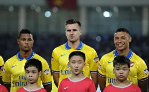 Vietnam V Arsenal 2013-14 Prints: Arsenal FC: Jenkinson, Gnabry, Oxlade-Chamberlain Line Up Against Vietnam (2013)