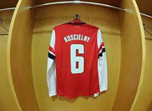 Arsenal V Bayern Munich 2013-14 Prints: Arsenal FC: Laurent Koscielny's Emirates Stadium Changing Room - Arsenal vs
