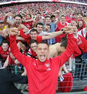 Arsenal V Hull City - FA Cup Final 2014 Prints: Arsenal FC: Lukas Podolski and Fans Celebrate FA Cup Victory at Wembley Stadium