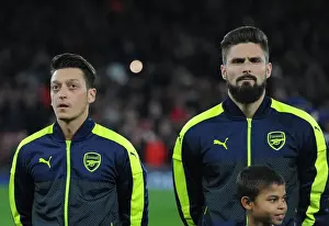 Arsenal V Paris Saint-Germain 2016-17 Prints: Arsenal FC: Ozil and Giroud Sharing a Pre-Match Moment before Arsenal vs Paris Saint-Germain