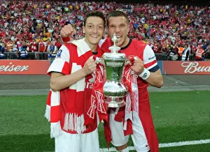 Arsenal V Hull City - FA Cup Final 2014 Prints: Arsenal FC: Ozil and Podolski Celebrate FA Cup Victory