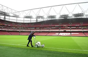 Arsenal FC: Preparing the Emirates Stadium Pitch for Arsenal vs. Nottingham Forest (2022-23)