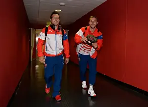 Arsenal FC: Santi Cazorla and Lukas Podolski Arrive at Emirates Stadium for Arsenal v Southampton, League Cup 2014/15
