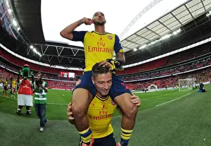 Arsenal V Aston Villa - FA Cup Final 2015 Prints: Arsenal FC: Theo Walcott and Olivier Giroud Celebrate FA Cup Victory over Aston Villa