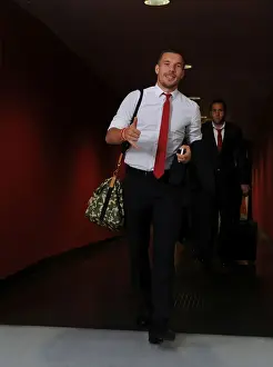 Arsenal V Galatasaray 2014/15 Champions League Prints: Arsenal FC vs. Galatasaray AS: Lukas Podolski Prepares for Champions League Clash at Emirates Stadium