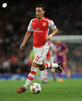 Arsenal V Galatasaray 2014/15 Champions League Prints: Arsenal FC vs Galatasaray: Mesut Ozil in Action at the Emirates Stadium - 2014/15 Champions League