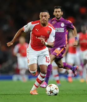 Arsenal V Galatasaray 2014/15 Champions League Prints: Arsenal FC vs Galatasaray: Oxlade-Chamberlain in Champions League Action at Emirates Stadium