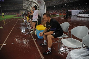 Arsenal V Man City - Pre Season 2012-13 Prints: Arsenal FC vs Manchester City: Marcus Szensson Leads Arsenal's Fitness Training at 2012 Beijing Pre-Season Clash