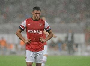 Images Dated 27th July 2012: Arsenal FC vs Manchester City: Alex Oxlade-Chamberlain Faces Off in Beijing
