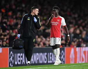 Arsenal FC vs Sevilla FC: Bukayo Saka Receives Medical Attention in Group B - UEFA Champions League 2023/24