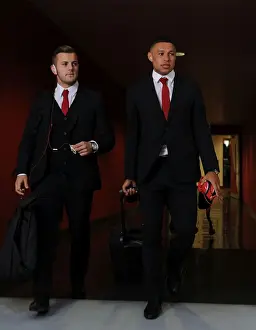 Arsenal V Galatasaray 2014/15 Champions League Prints: Arsenal FC: Wilshere and Oxlade-Chamberlain's Pre-Match Huddle vs Galatasaray at Emirates Stadium