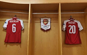 Arsenal v Atletico Madrid 2017-18 Collection: Arsenal FC's Empty Changing Room: Koscielny, Mustafi, Ozil, Lacazette