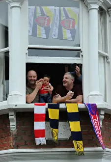 Arsenal FA Cup Final Victory Parade 2014-15 Prints: Arsenal FC's FA Cup Victory: A Sea of Jubilant Fans Celebrates at Emirates Stadium (2014-15)