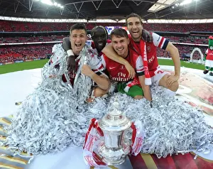 Arsenal FC's Jubilant FA Cup Victory: Olivier Giroud, Bacary Sagna, Aaron Ramsey, and Mathieu Celebrate